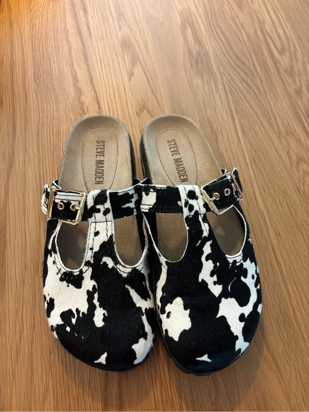 Steve Madden Women’s Black & White Cow-Print Slip-Ons